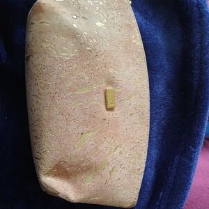 Gold and Tan Bag With Zipper Closure